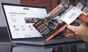 tracking direct mail marketing campaign performance with Spectrum Mail Plus online dashboard with direct mail example in hand